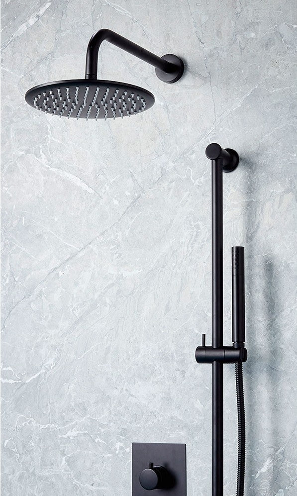 Black shower head and control panel on a gray wall