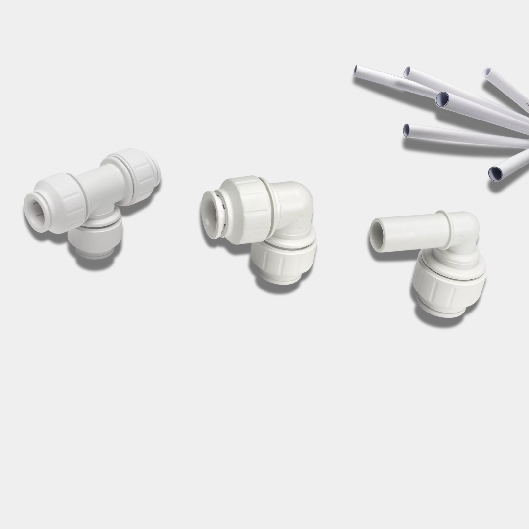 John-Guest-Speedfit fittings and pipes with a blurred background of a warehouse