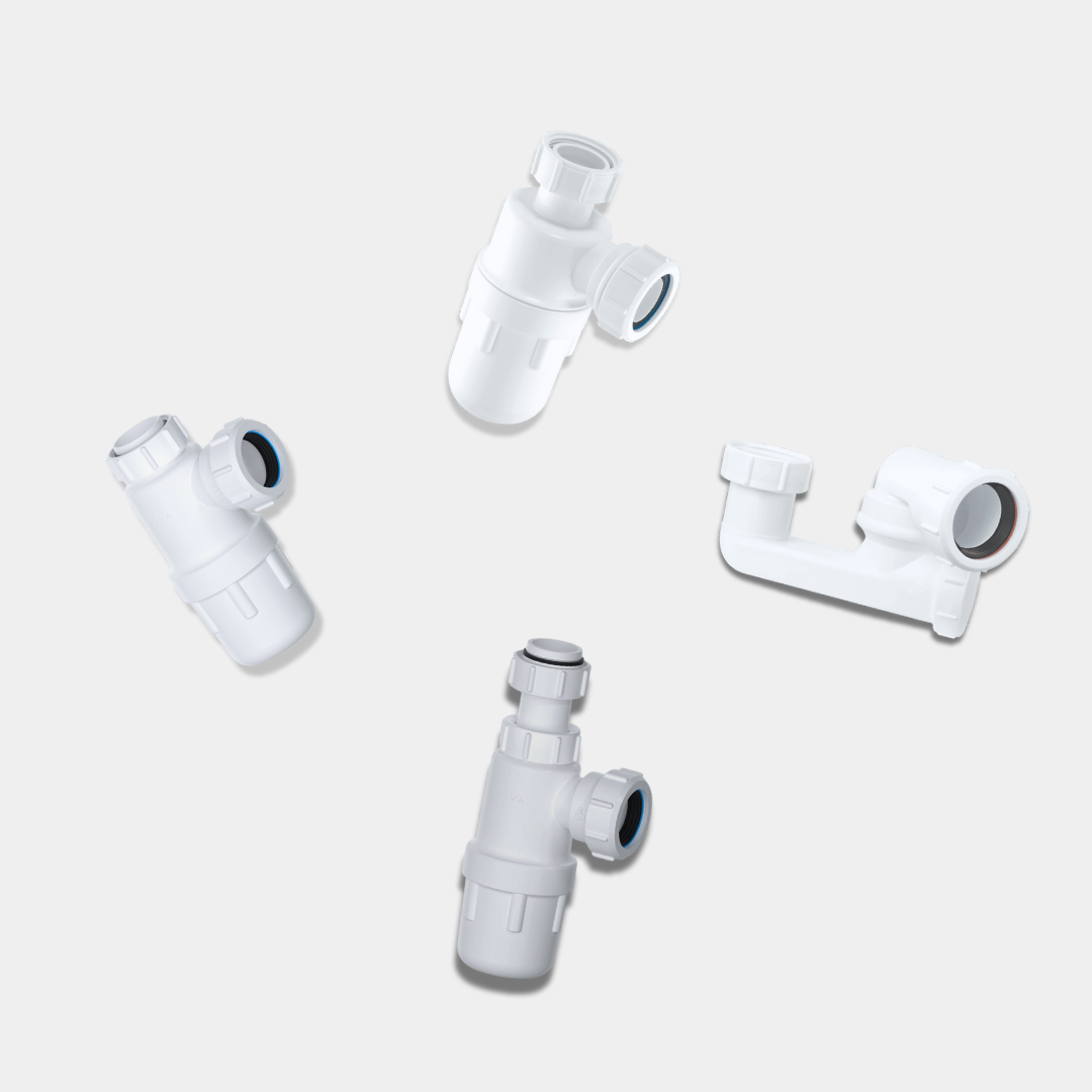 Plumbing Traps Arranged on a light grey background