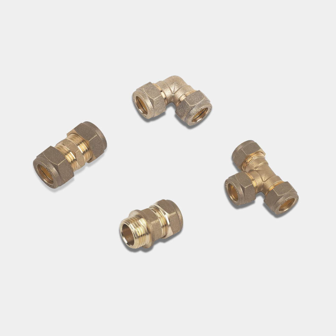 Compression-Conex fittings arranged on a light grey back ground