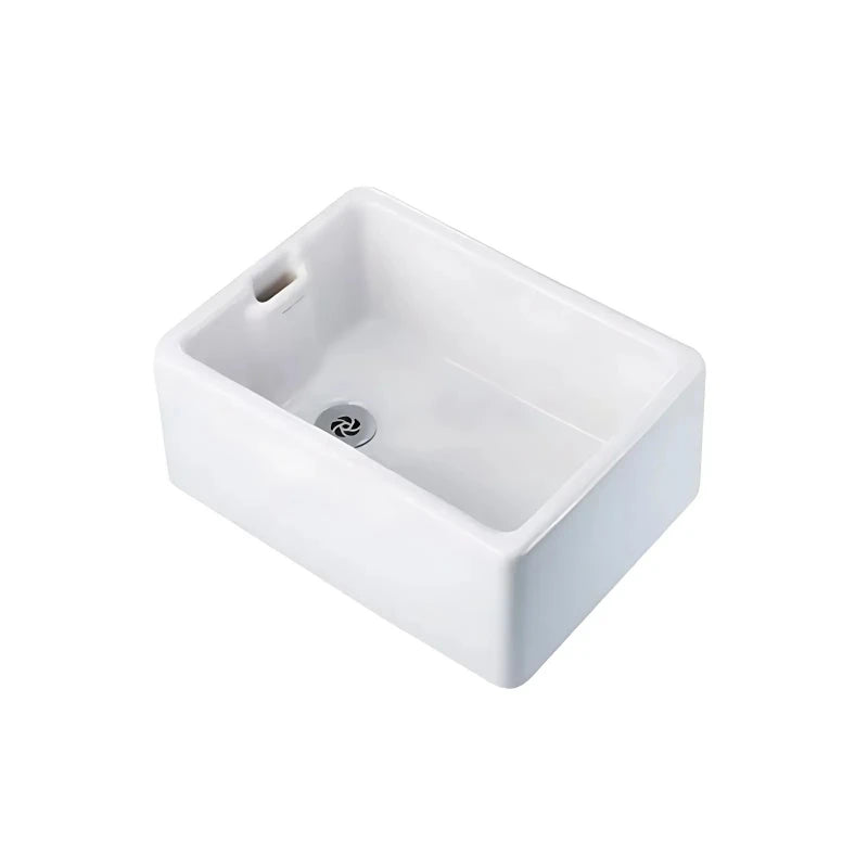 White ceramic sink on a white background