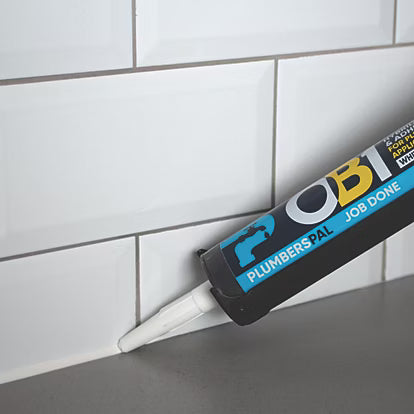 Ob1 being appled to the edge of a worktop to seal the gap between it and the tiled wall