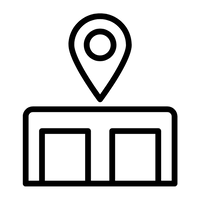 Black line icon of a map pin above a building on a white background